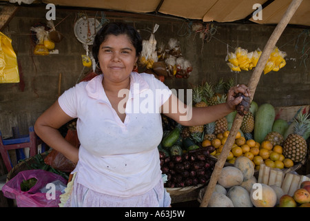 Fruits vegetables female vendor at Mercadito Subtiava Leon Nicaragua Stock Photo