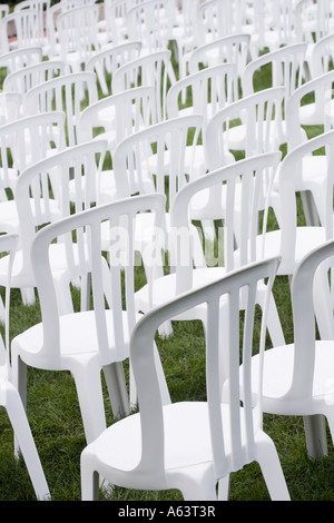 White plastic chairs set for an event Stock Photo