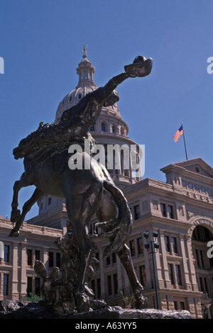 Roosevelt Rough Rider Statue on the Texas State Capitol Grounds Austin Texas with State Capitol building in background Stock Photo