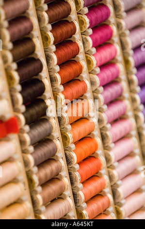 Cotton reels on display in fabric shop. Picture by Jim Holden. Stock Photo