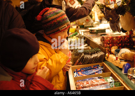 Little boys at the christmas market Augsburg Germany Stock Photo