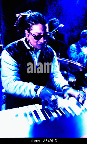 Jazz pianist playing in a nightclub Stock Photo