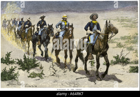 African American buffalo soldiers marching in the Arizona desert during Apache wars 1880s. Hand-colored woodcut of a Frederic Remington illustration Stock Photo