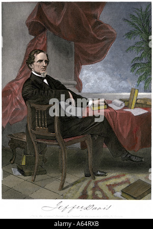 Jefferson Davis President of the Confederate States of America at his desk. Hand-colored steel engraving Stock Photo