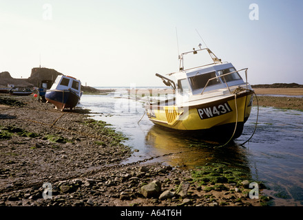 UK Cornwall Bude fishing boats on beach at low tide Stock Photo