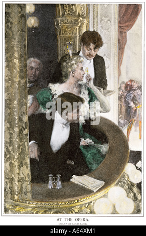 Upperclass family attending the opera in their box seats circa 1900. Hand-colored halftone of an illustration Stock Photo