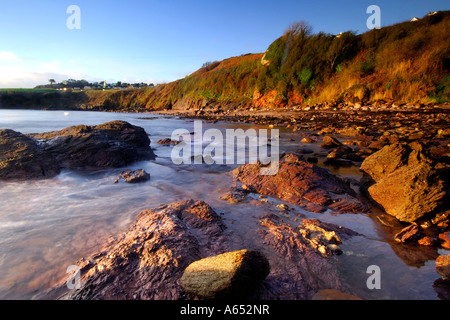 Beautiful dawn light at Saltern Cove near Paignton South Devon with the ...