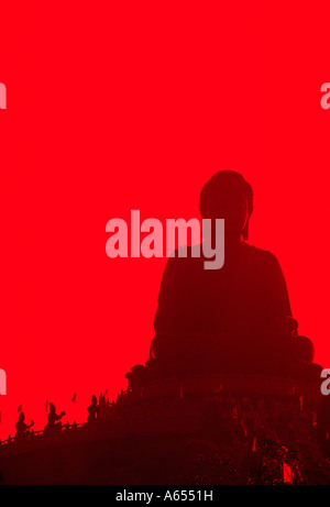 The Tian Tan Buddha sits above Ngong Ping on Lantau Island Hong Kong The bronze seated Buddha statue is 34 metres tall Stock Photo