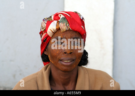 Woman wearing a traditional mud mask in Ifaty, north of Toliara, ( Tulear ), Madagascar Stock Photo