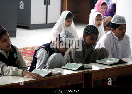 Muslim Students study the Koran inside the Kowloon Mosque and Islamic Center, Hong Kong, China Stock Photo