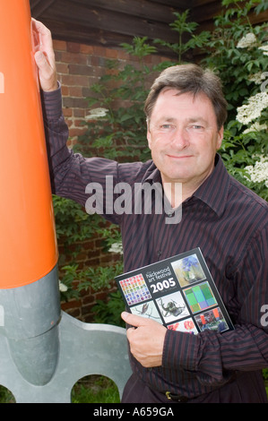 Alan Titchmarsh stands next to a giant garden fork Stock Photo