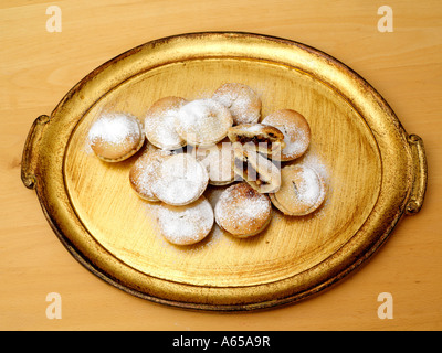 Home Baked Mince Pies with One Cut Open on Gold Platter Stock Photo