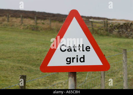 cattle grid and cattle grid warning sign Stock Photo - Alamy