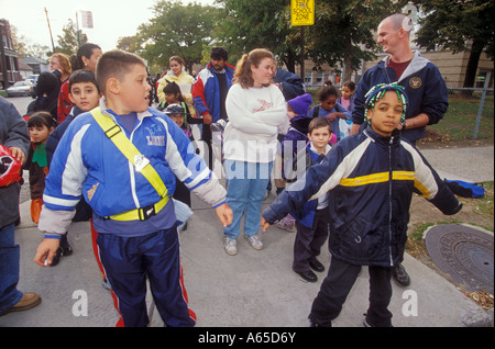 Detroit Michigan Children serving as crossing guards outside Maybury Elementary School Stock Photo