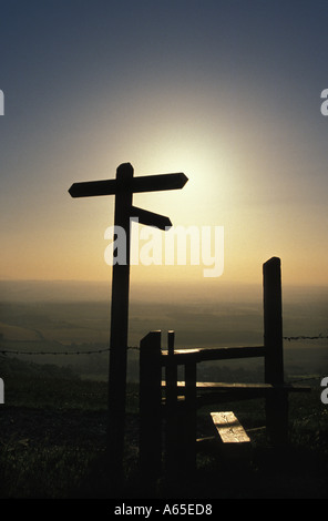 signpost and stile South Downs Sussex England Stock Photo
