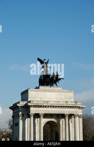 Front view of Wellington Arch against blue sky at Hyde Park Corner London England Stock Photo