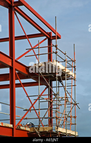 scaffold up against the steel work of a new development in truro,cornwall,england Stock Photo