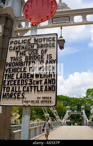 Antique Police Notice Warning Sign on Cavenagh Bridge Singapore Stock Photo