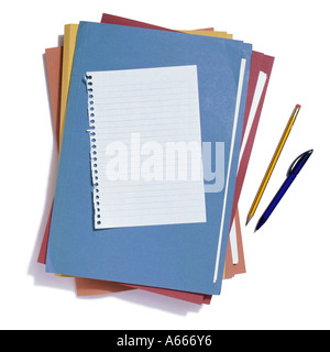 A selection of coloured folders and a sheet of lined paper Stock Photo