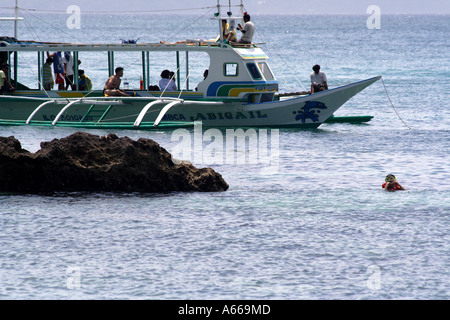 Snorkeling off of a boat on Boracay, Philippine Islands Stock Photo