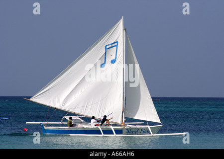 Sailboat sailing near the beach on Boracay, Philippine Islands Stock Photo