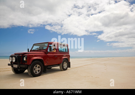Four wheel driving on the beaches of Fraser Island The world's largest sand island has no paved roads Stock Photo