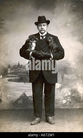 Man With Pekingese Stock Photo