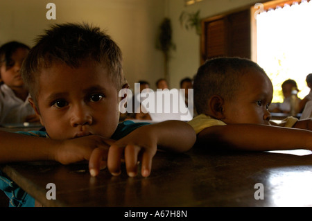 Khmer school children are studying in their classroom at the small Sras Srong school of Norkor Thom, Ankgor Wat, Cambodia. Stock Photo