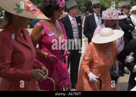 Wealthy British monied group of people going horse racing entering Royal Ascot stands. 2006 2000s UK HOMER SYKES Stock Photo