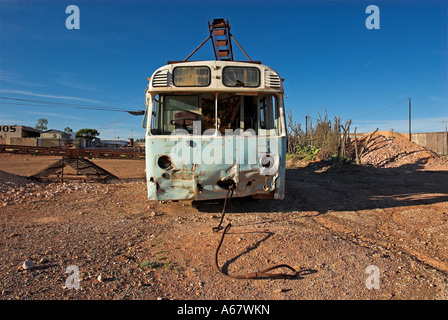 Old bus which was converted to a mining machine, Coober Pedy, South Australia, Australia Stock Photo