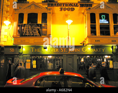 Nightlife entertainment on the streets of Temple Bar Dublin outside The Oliver St John Gogarty pub Dublin Ireland Stock Photo