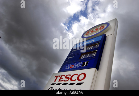 An Esso and Tesco petrol station sign at Woodingdean near Brighton East Sussex Stock Photo