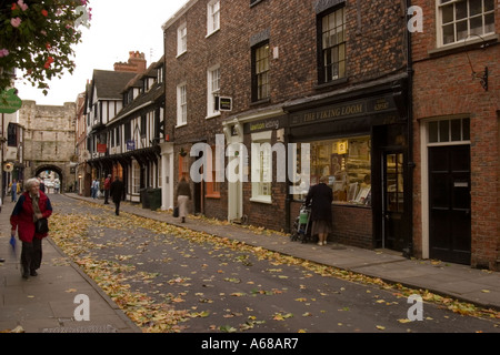 View along High Petergate York with autumn leaves Stock Photo