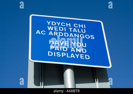 Parking sign in Wales showing Welsh language & English, Brecon, Powys, Wales, UK. Stock Photo