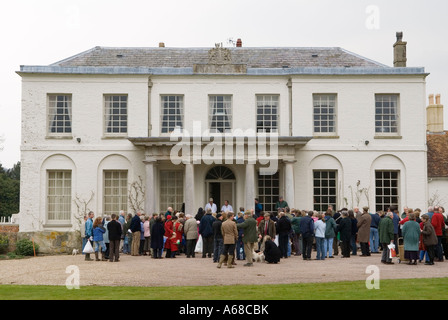 Tichborne House, near Alresford Hampshire, parishioners collecting the dole on Lady  Day March 25th 2007. 2000s UK HOMER SYKES Stock Photo