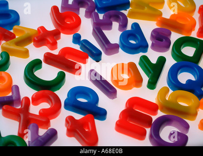 Childs magnetic letters spelling childs play Stock Photo