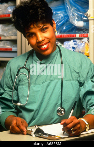 Portrait of a nurse at at nurses station Stock Photo