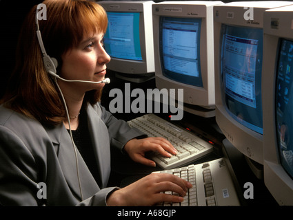 Woman telephone operator or customer service representative Stock Photo