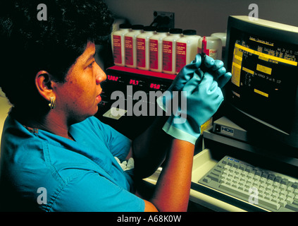 Technician in a blood gas lab Stock Photo