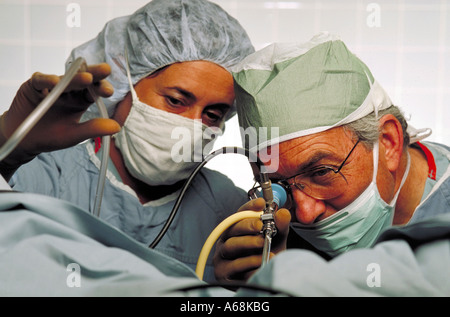 Obstetrician gynecologist surgeon conducts endoscopic surgery Stock Photo