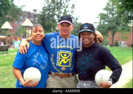 Volleyball coaches ages 23 and 50 participating in the Selby Day Parade. St Paul Minnesota USA Stock Photo