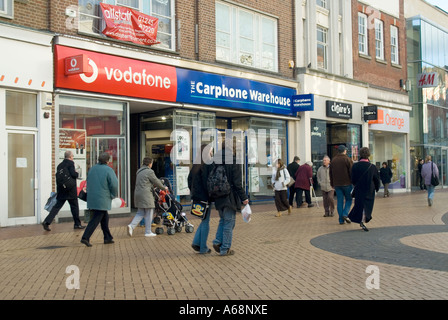 Three mobile phone shops close together in pedestrianised shopping High street Chelmsford Essex England UK Stock Photo