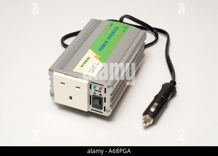 Electrical power inverter to produce 240 volt AC electricity supply from 12 volt DC supply such as car battery via cigar lighter Stock Photo
