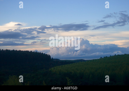 Rolling clouds over forested hills in the Brazillian countryside Stock Photo