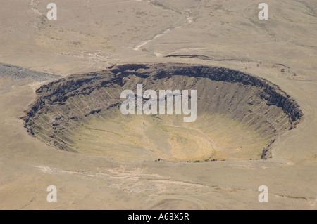 Aerial view of a collapsed volcanic (parasite) crater at the base of Ol Donyo Lengai, Tanzania Stock Photo