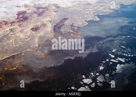 Aerial view of salt crusts on the edge of open water (lower right corner), Lake Natron, Tanzania Stock Photo