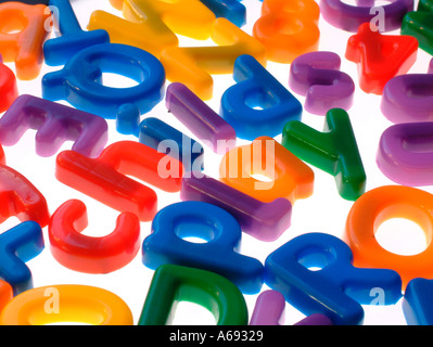 Childs magnetic letters spelling childs play Stock Photo