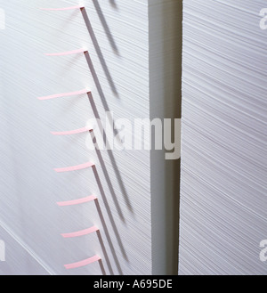 STACK of NEWLY MADE PAPER IN PAPER MILL UK Stock Photo