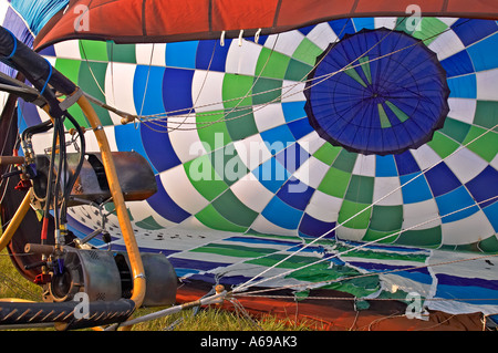 Inflating an air balloon with hot air with help of gas-jet Stock Photo