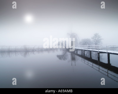 The only windmill that can be visited in Kinderdijk the Netherlands is closed in the winter Stock Photo